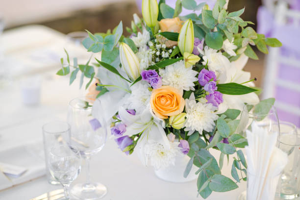 istock Beautiful fresh flowers table decoration in a restaurant for a special event 1027016240