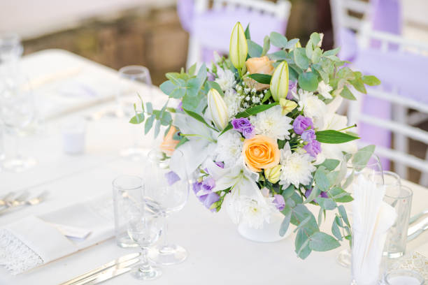 istock Beautiful fresh flowers table decoration in a restaurant for a special event 1027016310