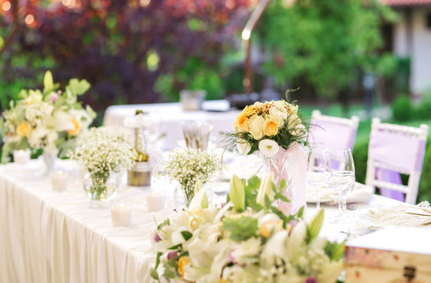 istock Beautiful fresh flowers table decoration in a restaurant for a special event 1027016522