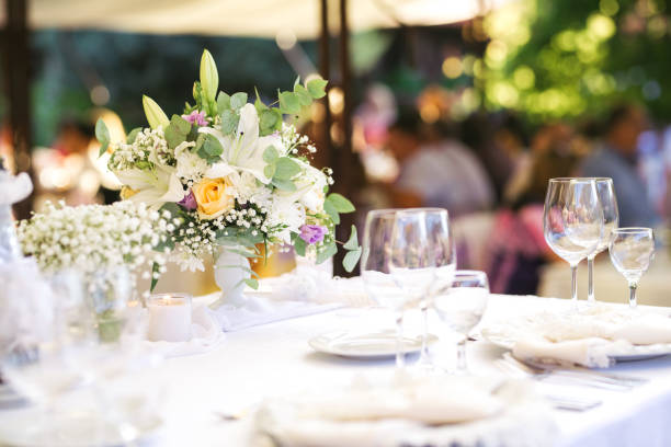 istock Beautiful fresh flowers table decoration in a restaurant for a special event 1027016618