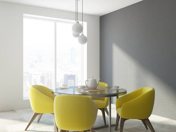 istock Yellow chair dining room corner, white wall 1027027222