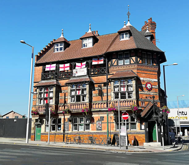 London, UK - June 3rd 2024: The exterior of The George public house, also known as The George Inn - the only remaining galleried coaching inn in London, UK.