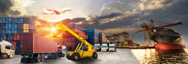 istock Logistics and transportation of Container Cargo ship and Cargo plane with working crane bridge in shipyard at sunrise, logistic import export and transport industry background 1027033834
