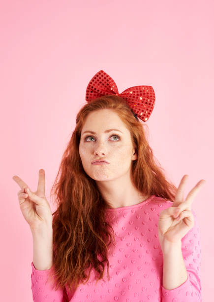 istock Peace sign made by girl at studio shot 1027040514