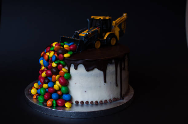 istock Birthday chocolate cake with tractor on top 1027043732