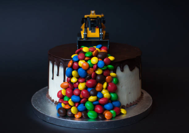 istock Birthday chocolate cake with tractor on top 1027043734