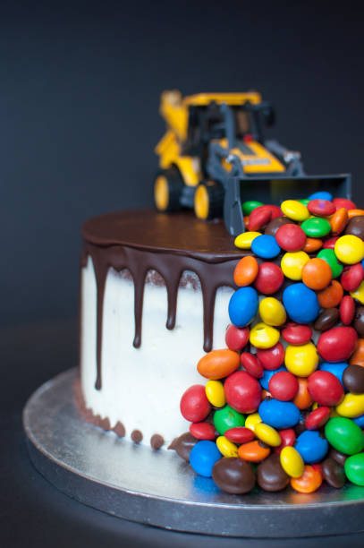 istock Birthday chocolate cake with tractor on top 1027043738