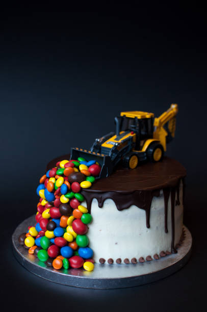istock Birthday chocolate cake with tractor on top 1027043740