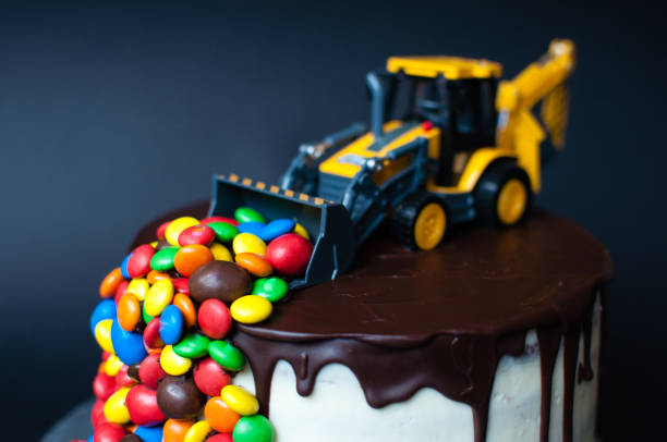 istock Birthday chocolate cake with tractor on top 1027043760