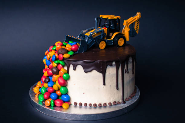 istock Birthday chocolate cake with tractor on top 1027043764