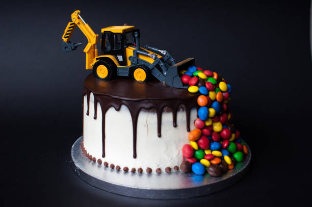 istock Birthday chocolate cake with tractor on top 1027043768