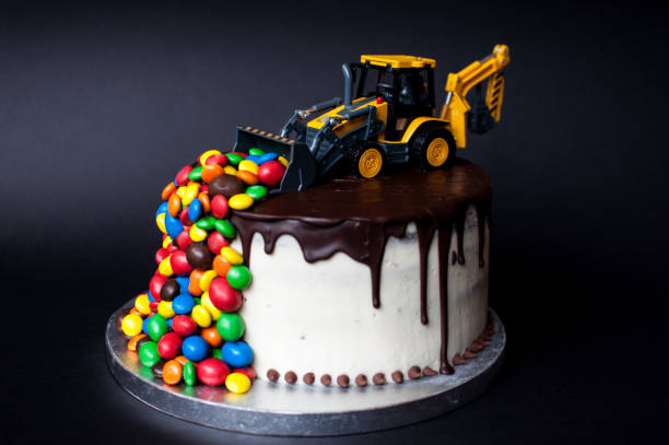 istock Birthday chocolate cake with tractor on top 1027043774