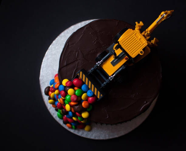 istock Birthday chocolate cake with tractor on top 1027043802