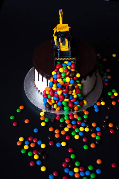 istock Birthday chocolate cake with tractor on top 1027043810
