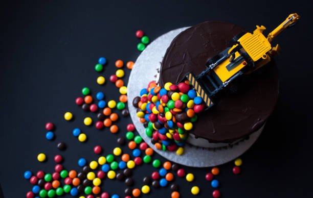 istock Birthday chocolate cake with tractor on top 1027043864