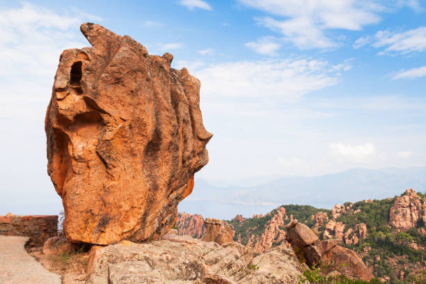istock Huge stone stands on a roadside, Corsica 1027045144