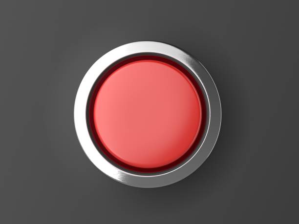 bouton rouge brillant avec des éléments métalliques isolés sur fond noir - push buttons photos et images de collection