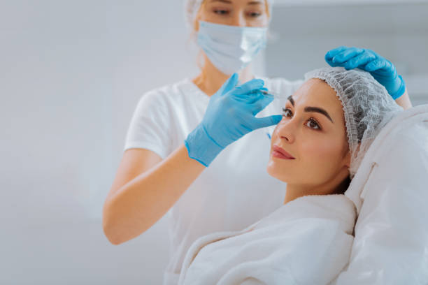 istock Nice positive woman having anti age therapy 1027059512