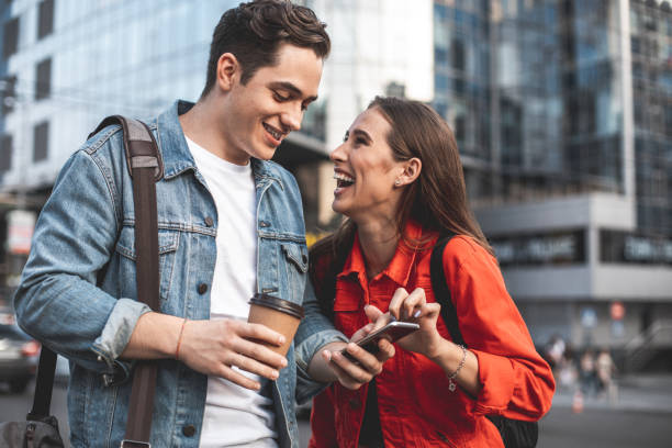 istock Delighted couple having fun in city 1027059948