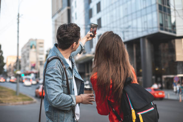 istock Loving couple making selfie on street 1027060030