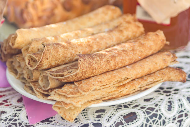 istock Russian pancakes rolled on a plate, close up 1027064204