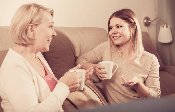 istock Mom and adult daughter talking 1027079274