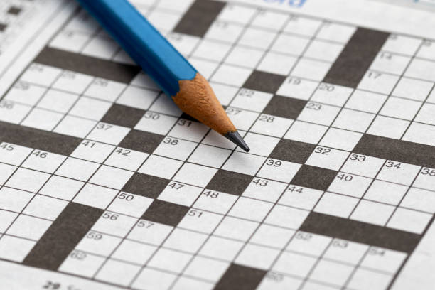 Crossword Puzzle with pencil stock photo