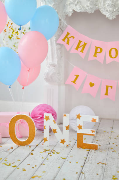 istock First birthday. Children Birthday. 1027090588