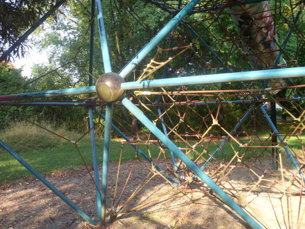 istock Close up metallic children playground equipment for climbing 1027097304