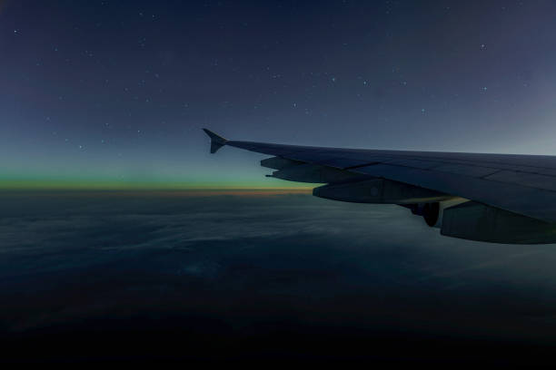 istock Space Stars Aurora Plane View from Airbus A380 Window 1027097480