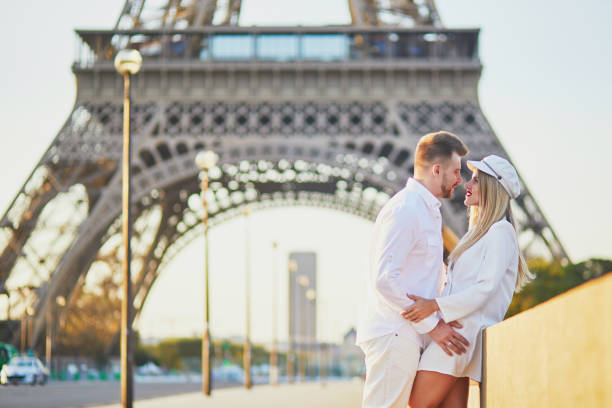istock Happy couple near the Eiffel tower 1027100830