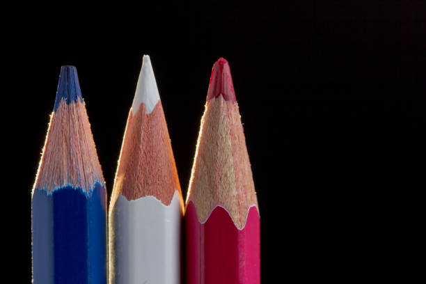istock pencil isolated on black background close up. 1027110166