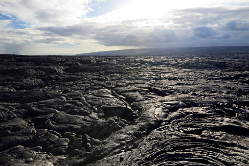 Endless lava fields of the Big Isalnd of Hawaii. Smooth, undulating surface of frozen pahoehoe lava. Hawaii, USA.