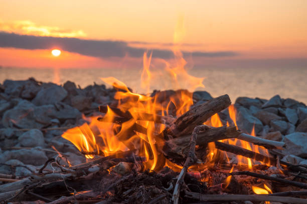 istock fire burns near the sea 1027121032