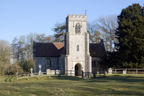 The Church of Saint John in the village of Farleigh Wallop, near Basingstoke, Hampshire.  The church was re-built in the middle of the eighteenth century with flint and stone.  Graves surrounding the church belong to members of the family of the Earl of Portsmouth and other landed gentry of the past few centuries.