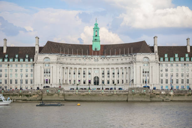 London County Hall seen from the north bank of the River Thames The exterior of London County Hall seen from the north bank of the River Thames london county hall stock pictures, royalty-free photos & images