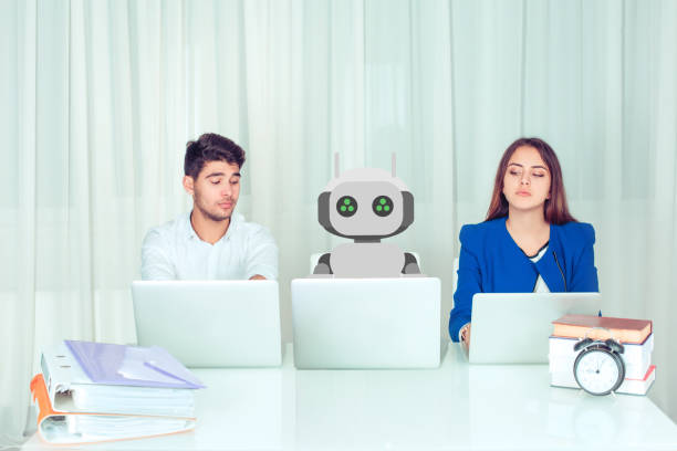 istock Envious colleagues about robot coworker 1027128974