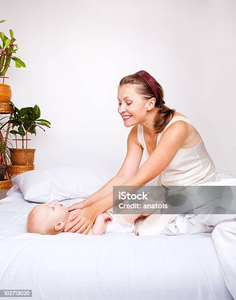 Mom And Baby Having A Happy Time Stock Photo - Download Image Now - Adult, Baby - Human Age, Beautiful People