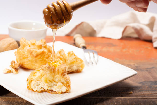 istock French snack pouches made from puff pastry with fresh soft goat cheese and honing 1027144302