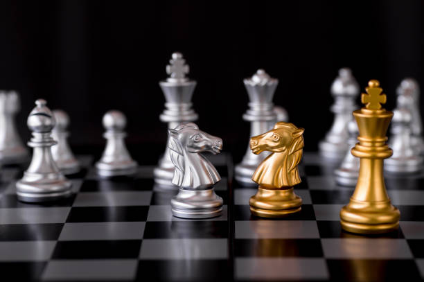 istock Confrontation of chess, business fighting concept 1027149974