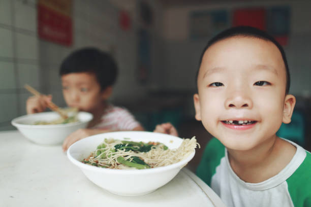 Cute child enjoying lunch