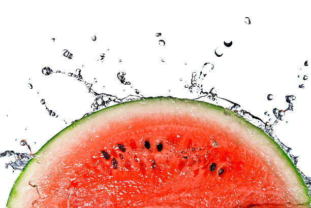 istock Slice of watermelon splashing into water 102715314
