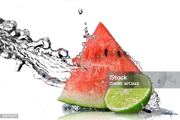 Watermelon And Lime With Water Splash Stock Photo - Download Image Now - Splashing, Watermelon, Citrus Fruit