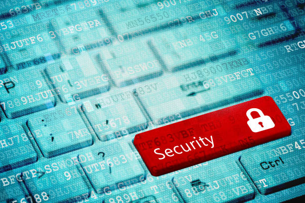 istock Red key with text Security and padlock icon on blue digital laptop keyboard 1027161052