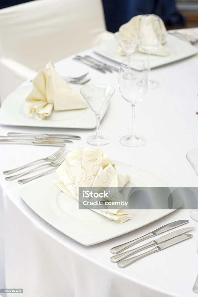 White Elegant Table Set for Dinner  Arrangement Stock Photo