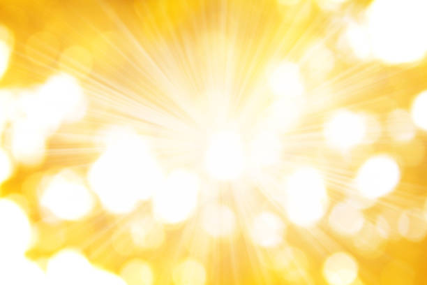 The rays of the sun on golden background