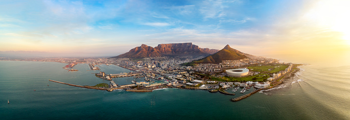 Super high resolution establishing aerial photograph of the city of Cape Town during sunset