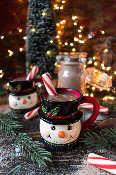 istock Christmas Snowman mugs of hot cocoa 1027169622