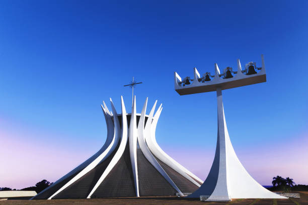 Brasilia Cathedral Brasília, DF, Brazil - Algust 12, 2018: Side view photo from Brasília Cathedral. It was planned by the architect Oscar Niermeyer and inaugurated in May 31, 1970. It's located at Eixo Monumental brasilia stock pictures, royalty-free photos & images