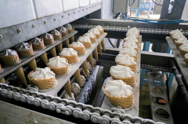 the conveyor automatic lines for the production of ice cream - semi skimmed milk imagens e fotografias de stock